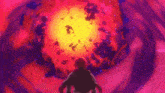 a person is standing in front of a red and yellow explosion
