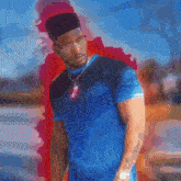 a man wearing a blue shirt that says " loyal "