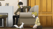 a man sits on a couch next to a girl kneeling down with a white squirrel