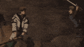 a man and a woman are standing next to each other with the man holding a knife