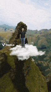 a man standing on a cloud on top of a mountain with a viggle.ai logo