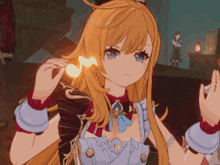 a girl with long blonde hair and blue eyes is holding a flame in her hand