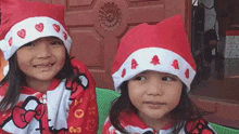 Santa Hat Santa Hat Led GIF - Santa Hat Santa Hat Led Two Girls GIFs