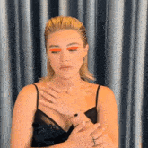 a woman with bright orange eye shadow on her eyebrows