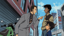 a man in a suit and tie is pointing at another man in a suit