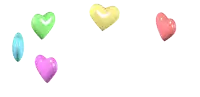 four colorful hearts are floating in the air