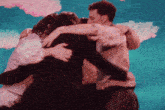 a group of people hugging each other in front of a blue sky
