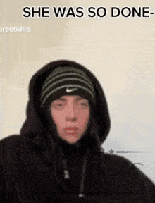 billie eilish is wearing a hoodie and a beanie and says she was so done .