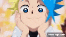 a boy with blue hair is making a funny face with his hands on his chin .