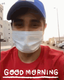 a man wearing a face mask and a hat says " good morning "