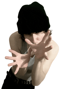 a person wearing a black hat and a white tank top is making a stop gesture