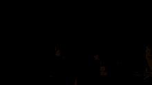 a group of cartoon characters are standing next to each other in a room .