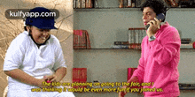 a man in a pink sweater is talking on a cell phone next to another man in a white shirt ..