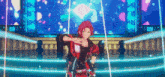 a man in a red jacket is dancing on a stage