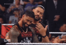 roman reigns bloodline laughing