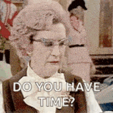 a woman wearing glasses and a bow tie is asking if she has time .