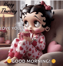 betty boop sitting in a chair holding a cup of hot chocolate