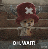 a stuffed animal with antlers and a hat that says i am a doctor on the bottom