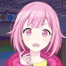 a girl with pink hair and pink eyes is wearing a pink jacket .