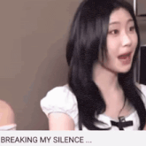 a close up of a woman 's face with the words breaking my silence below it