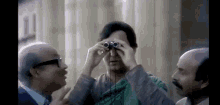 Satyajit Ray Detective GIF - Satyajit Ray Detective Binoculars GIFs