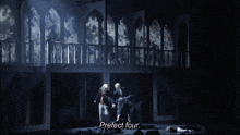 a group of people are standing in a dark room with their arms around each other