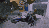 a cartoon character is laying on the ground with a giant spider behind him