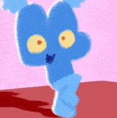 a blue cartoon character with big yellow eyes is standing on a red surface .