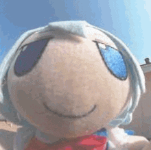 a close up of a stuffed animal 's face with sunglasses on it 's eyes .