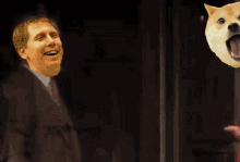 a man in a suit and tie stands next to a dog with its mouth wide open