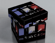 a black rubik 's cube that says star rica 's cell center on it