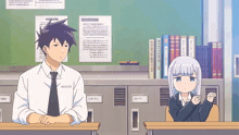 a man and a girl are sitting at desks in a classroom with papers on the wall that says ' chinese '