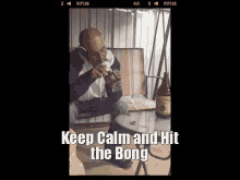 a man is smoking a bong with the words keep calm and hit the bong below him