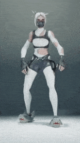 a woman wearing a mask and shark slippers stands on a white surface