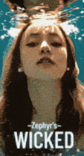 a poster for zephyr 's wicked showing a woman underwater