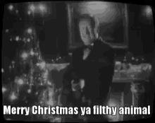Angels With Even Filthier Souls Merry Christmas Ya Filthy Animal GIF - AngelsWithEvenFilthierSouls MerryChristmasYaFilthyAnimal TommyGun GIFs