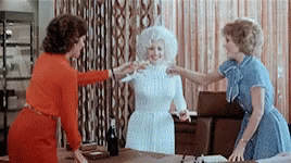 Tomlin, Parton and Fonda drinking a toast, from the film 9 to 5