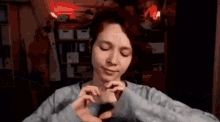 Heart With Hands Gifs Tenor
