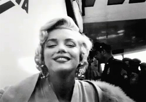 Blow Marilyn Monroe GIF