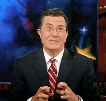 Stephen Colbert Report GIF - StephenColbert Report Fingerscrossed GIFs