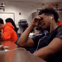 black guy crying listening to music meme