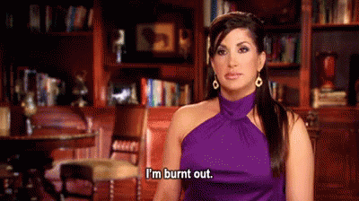 A GIF of a woman saying she's burnt out