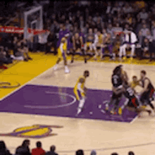 kuzma pushes lebron