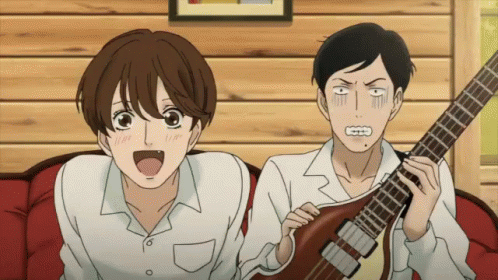 Two animated characters, one excitedly singing and the other playing a bass guitar with a serious expression.