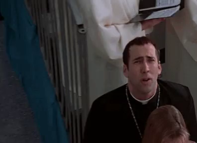 face off nicolas cage priest