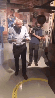 Bernie Gifs Tenor These are the most funny memes about bernie chair and his mittens. bernie gifs tenor