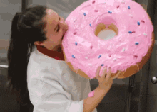 Image result for gif woman eating a giant doughnut