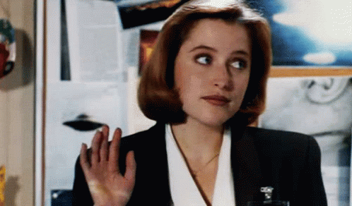 Dana Scully from the X-Files waving hello