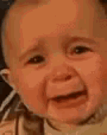 Image result for crying baby smiling gif