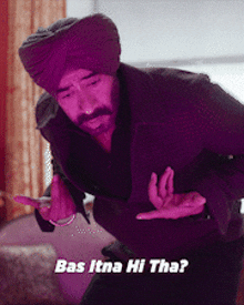 a man wearing a turban and a black coat says bas itna hi tha ?